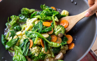 Vegetables cooking in a sauce pan